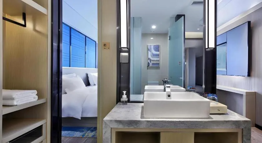 Bed in Echarm Hotel Guilin North High Speed Railway Station