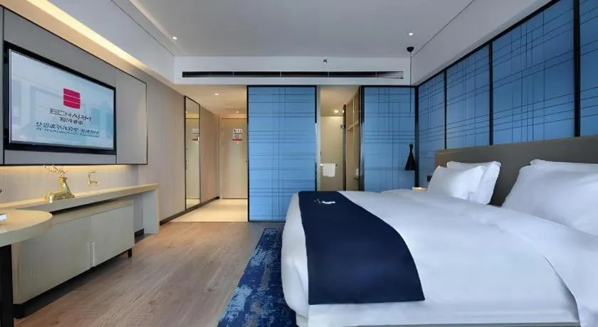 Bed in Echarm Hotel Guilin North High Speed Railway Station