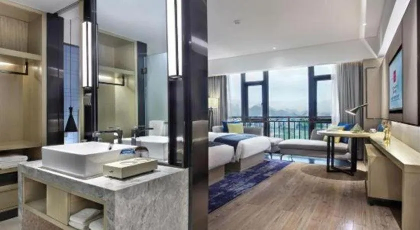 Bed in Echarm Hotel Guilin North High Speed Railway Station