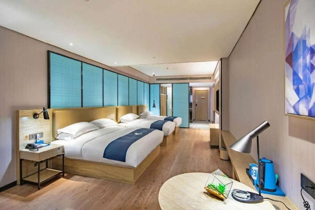 Bed in Echarm Hotel Guilin North High Speed Railway Station