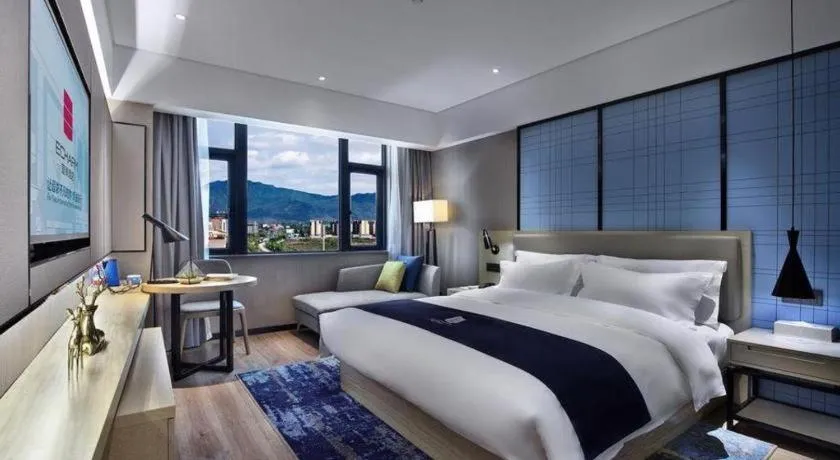 Bed in Echarm Hotel Guilin North High Speed Railway Station