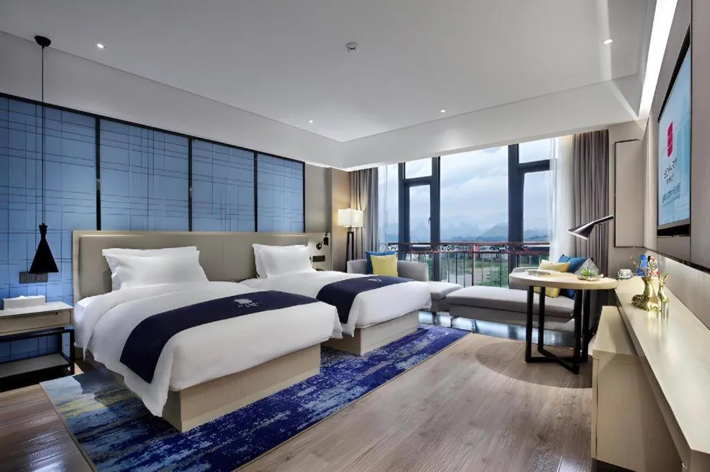 Bed in Echarm Hotel Guilin North High Speed Railway Station