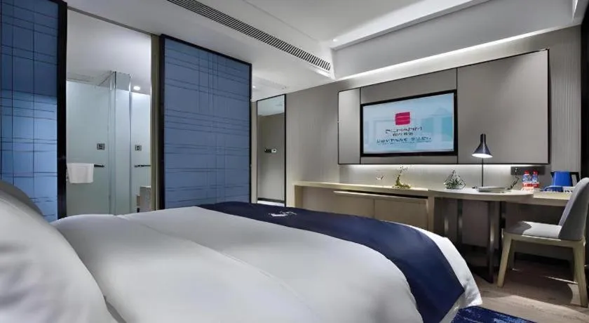 Bed in Echarm Hotel Guilin North High Speed Railway Station