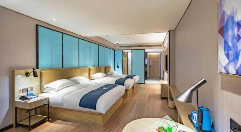 Bed in Echarm Hotel Guilin North High Speed Railway Station