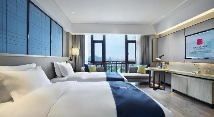 Bed in Echarm Hotel Guilin North High Speed Railway Station