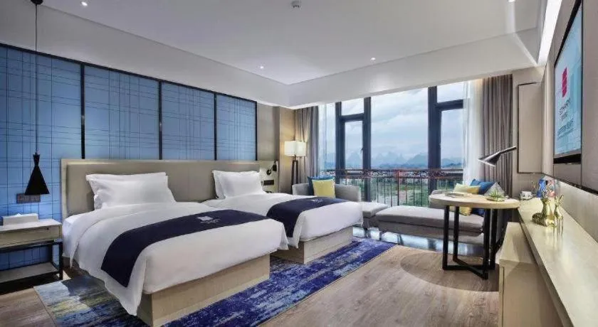 Bed in Echarm Hotel Guilin North High Speed Railway Station