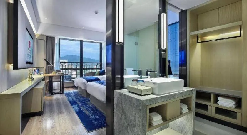 Bed in Echarm Hotel Guilin North High Speed Railway Station