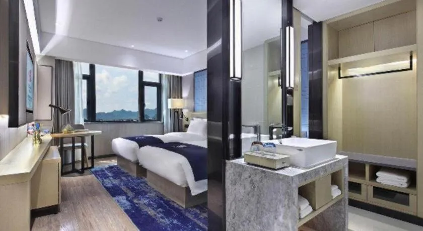 Bed in Echarm Hotel Guilin North High Speed Railway Station