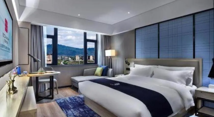 Bed in Echarm Hotel Guilin North High Speed Railway Station