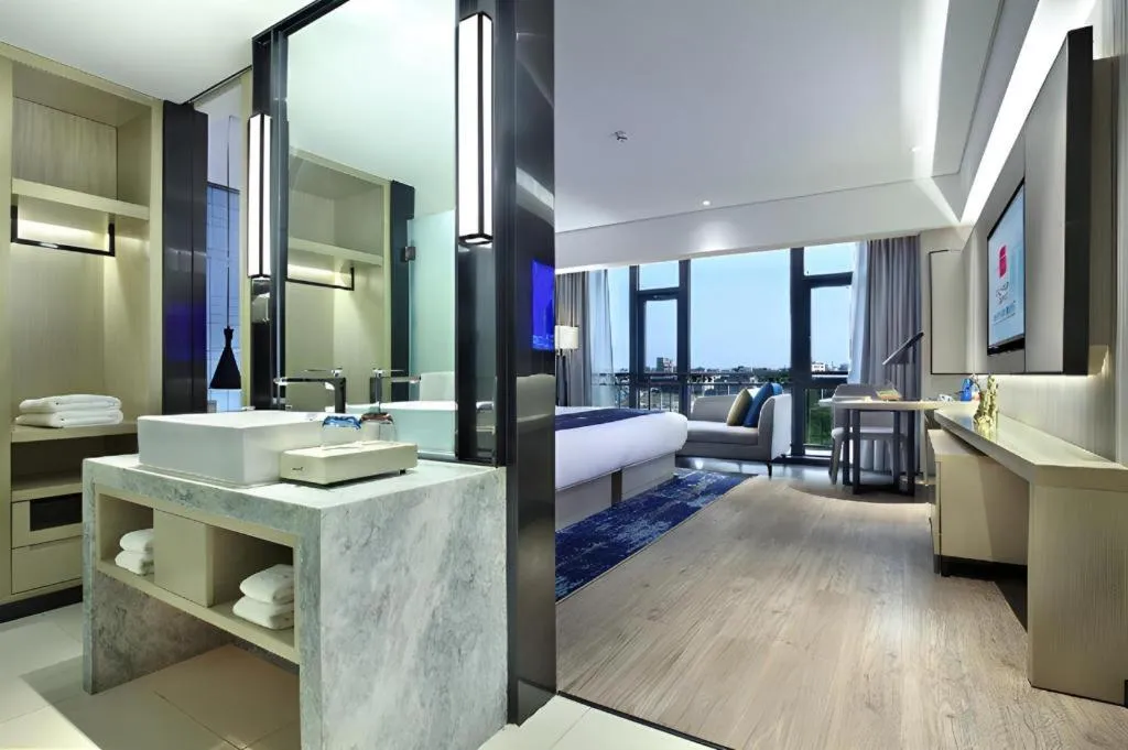 Bed in Echarm Hotel Guilin North High Speed Railway Station