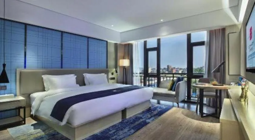 Bed in Echarm Hotel Guilin North High Speed Railway Station