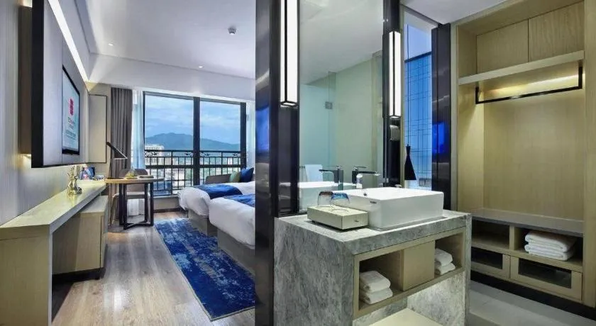 Bed in Echarm Hotel Guilin North High Speed Railway Station