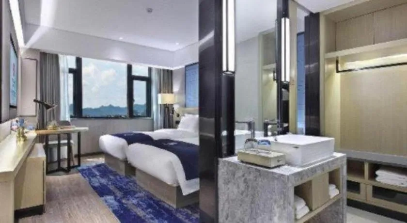 Bed in Echarm Hotel Guilin North High Speed Railway Station