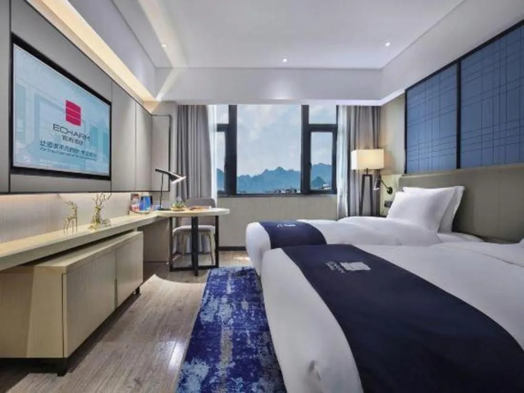 Bed in Echarm Hotel Guilin North High Speed Railway Station