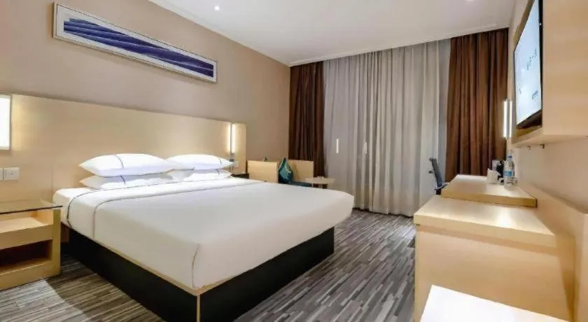 Bed in City Comfort Inn Hechi Du'an Wenti Square