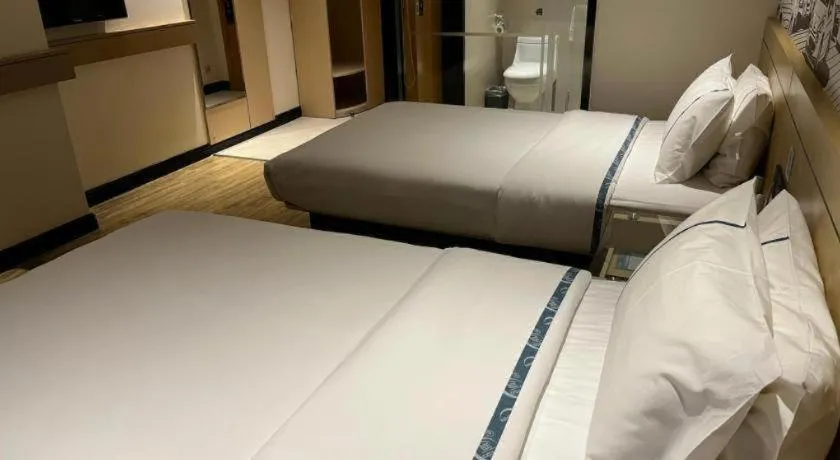 Bed in City Comfort Inn Hechi Du'an Wenti Square