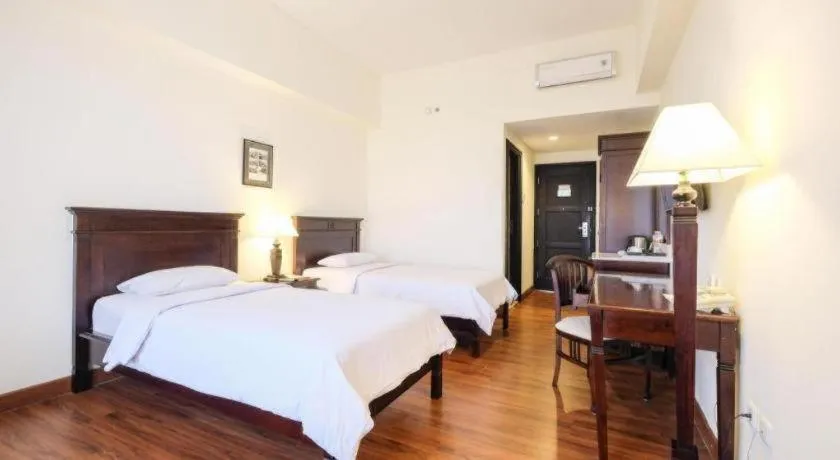 Bed in Colonial Hotel Makassar