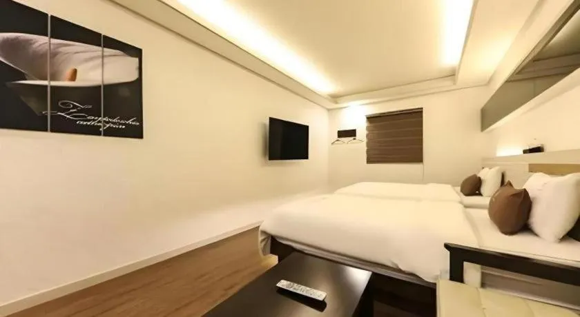 Bed in H Hotel