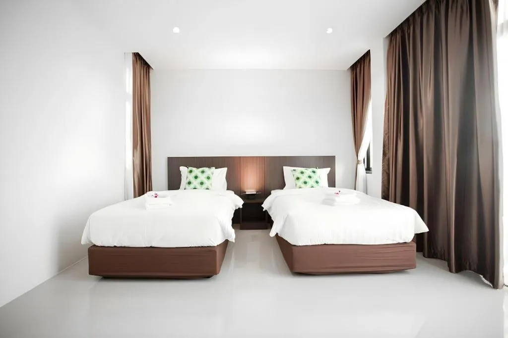 Bed in The Viewpoint Hotel
