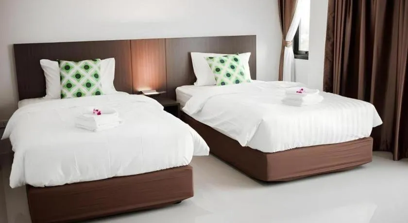 Bed in The Viewpoint Hotel