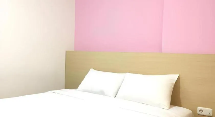 Bed in I&M Hotel Billiard