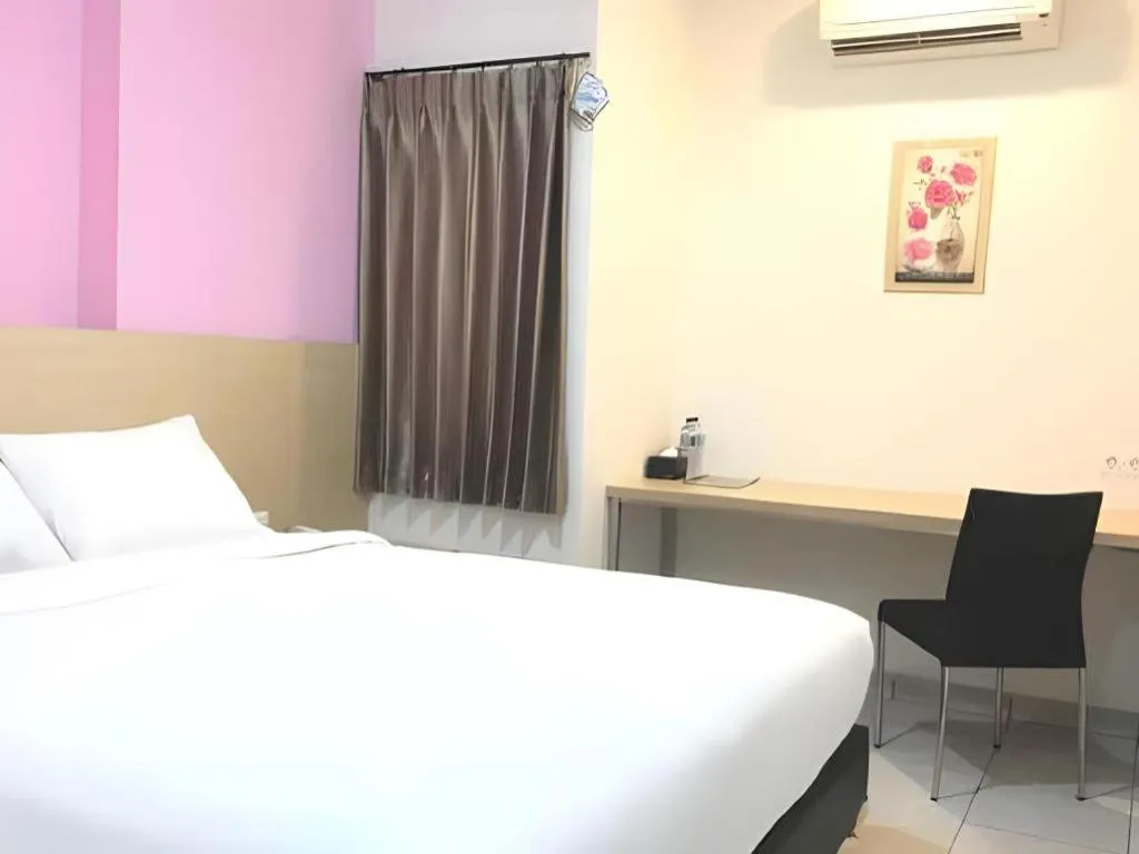 Bed in I&M Hotel Billiard