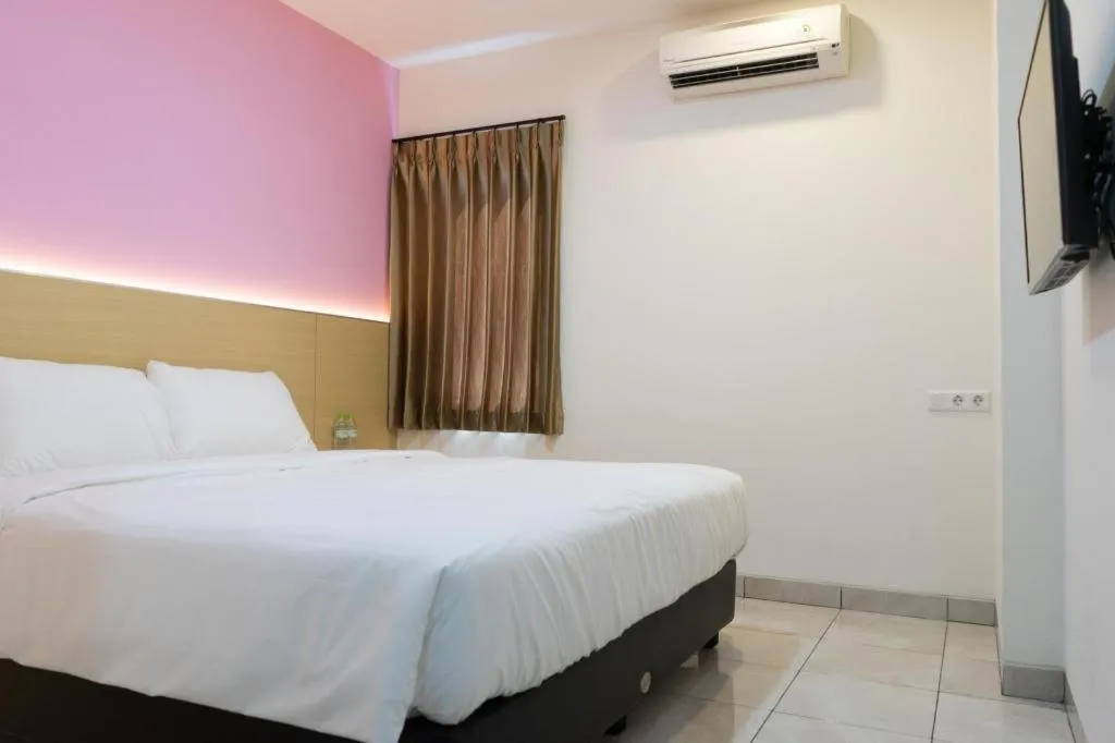 Bed in I&M Hotel Billiard