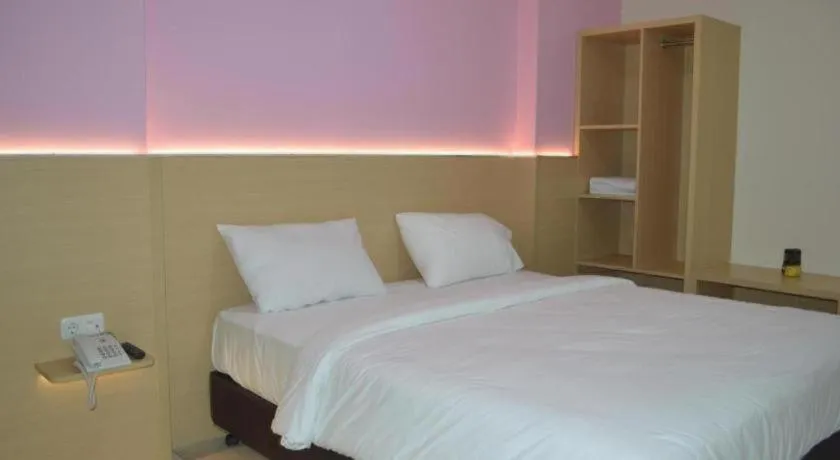 Bed in I&M Hotel Billiard