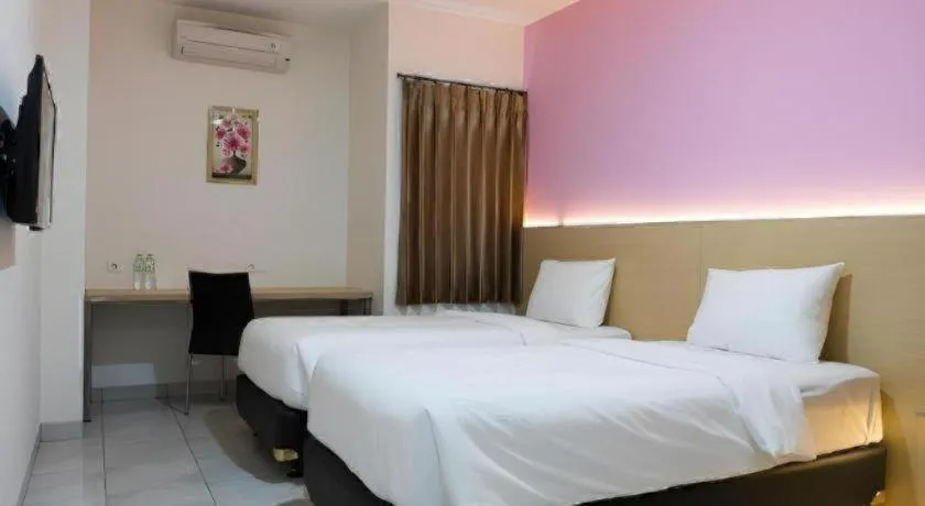 Bed in I&M Hotel Billiard