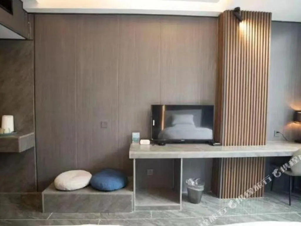 Bed in Haikou Kai Wei Hotel