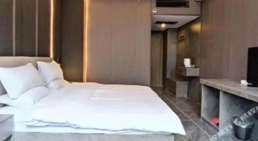 Bed in Haikou Kai Wei Hotel