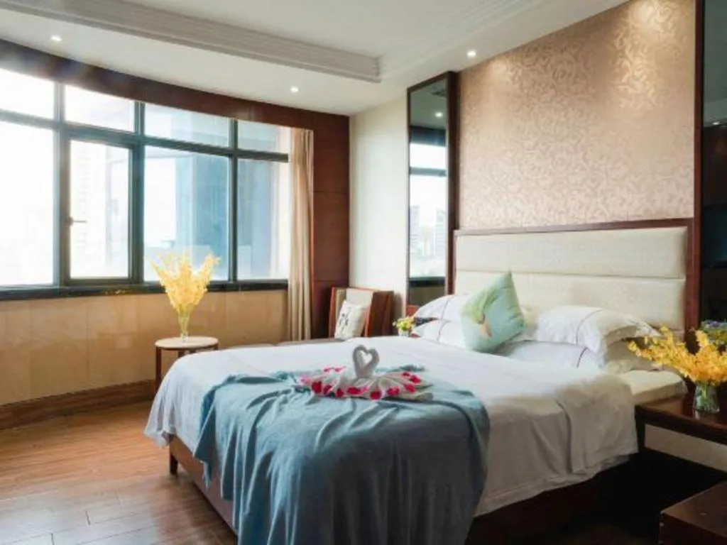 Bed in Haikou Kai Wei Hotel