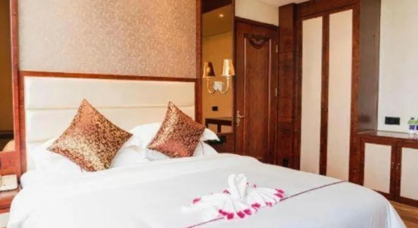 Bed in Haikou Kai Wei Hotel