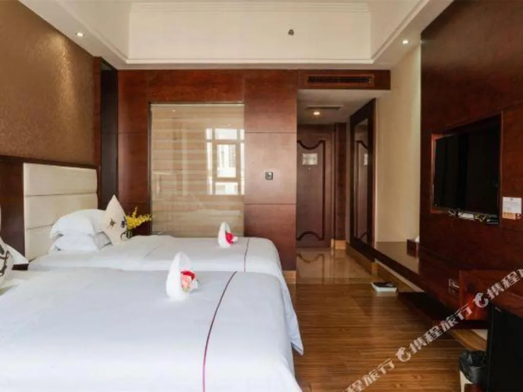 Bed in Haikou Kai Wei Hotel