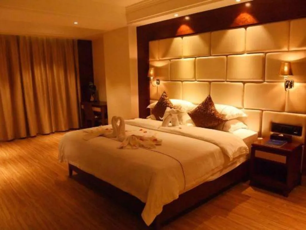 Bed in Haikou Kai Wei Hotel