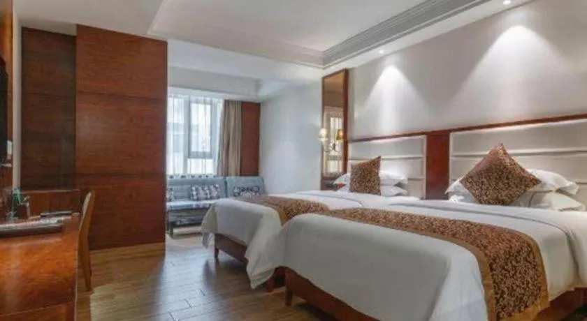 Bed in Haikou Kai Wei Hotel