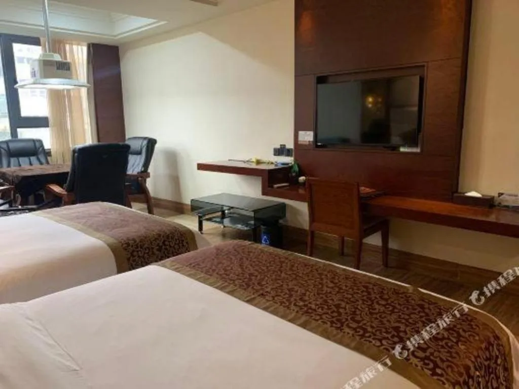 Bed in Haikou Kai Wei Hotel