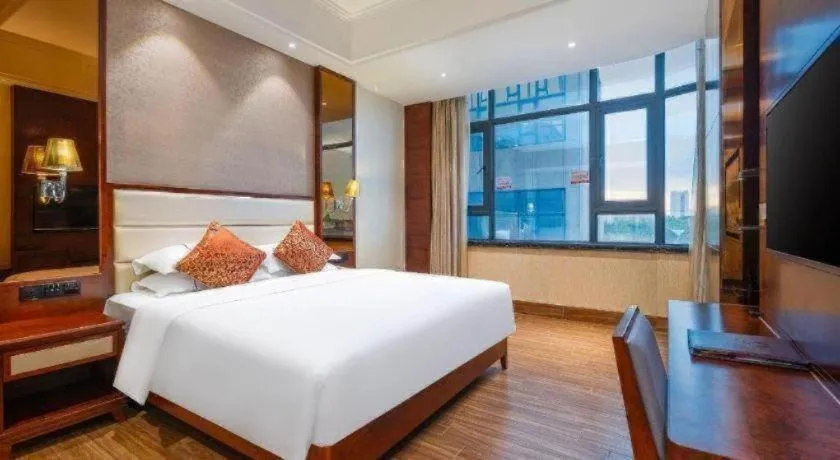 Bed in Haikou Kai Wei Hotel