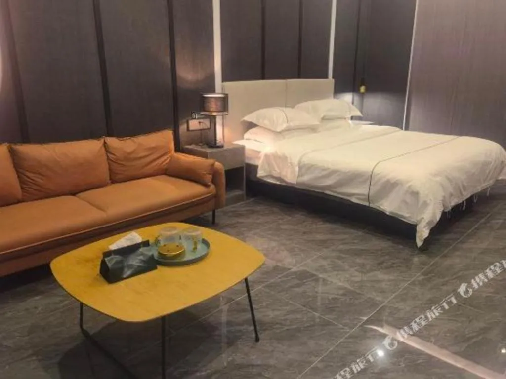 Bed in Haikou Kai Wei Hotel