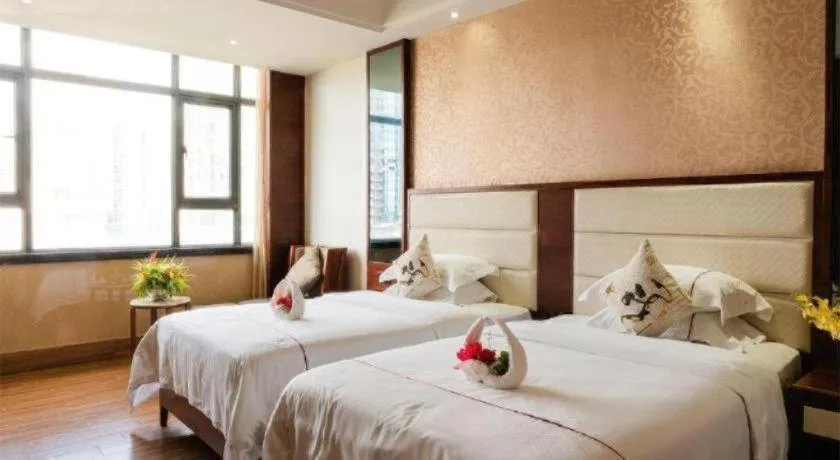 Bed in Haikou Kai Wei Hotel