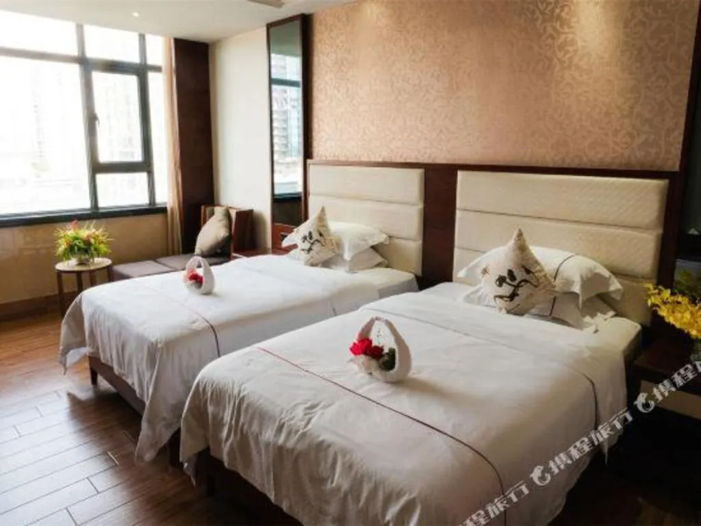 Bed in Haikou Kai Wei Hotel