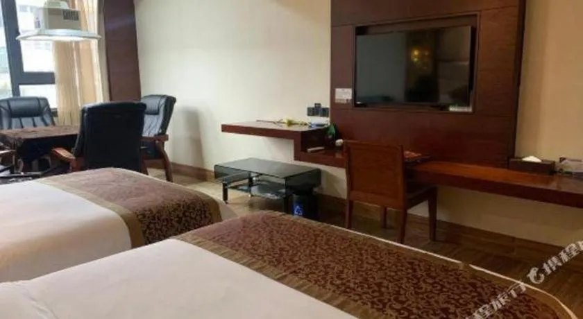 Bed in Haikou Kai Wei Hotel