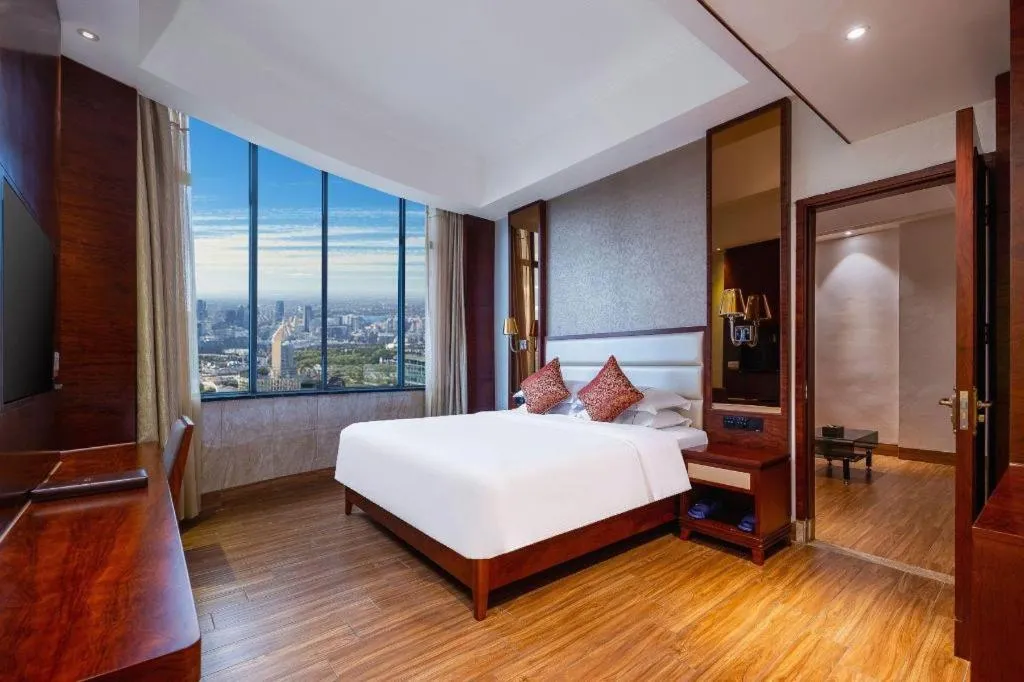 Bed in Haikou Kai Wei Hotel