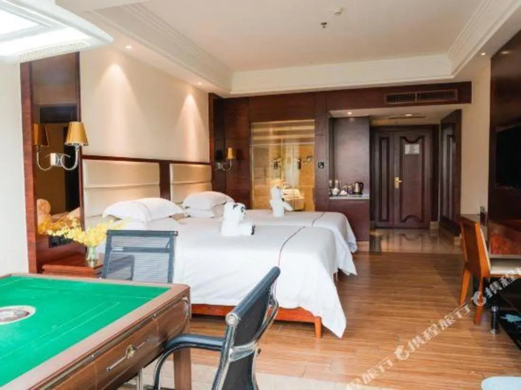 Bed in Haikou Kai Wei Hotel