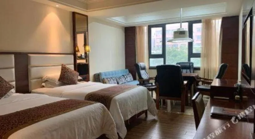 Bed in Haikou Kai Wei Hotel