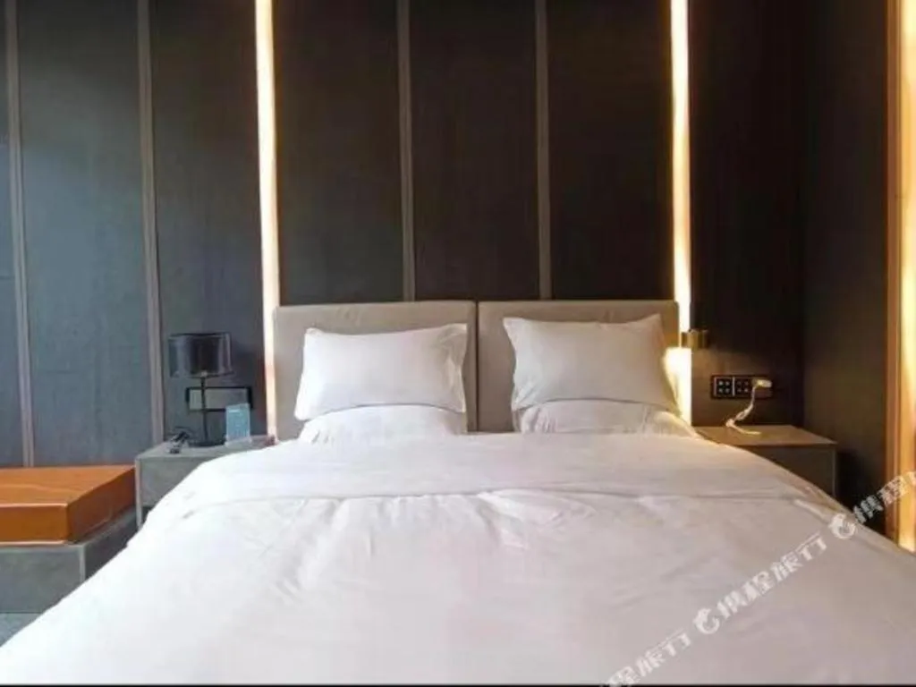 Bed in Haikou Kai Wei Hotel