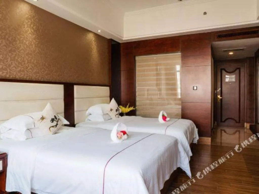 Bed in Haikou Kai Wei Hotel