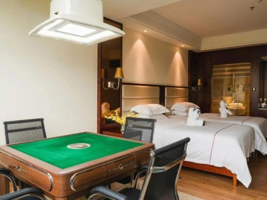 Bed in Haikou Kai Wei Hotel