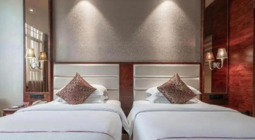 Bed in Haikou Kai Wei Hotel