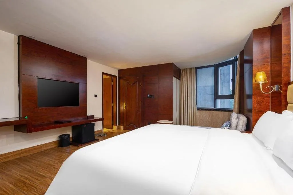 Bed in Haikou Kai Wei Hotel